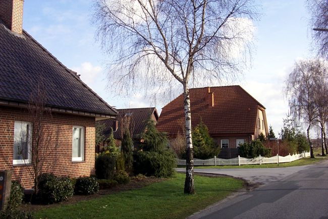Ein Haus mit gepflegte Beete